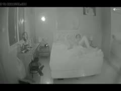 On a concealed camera, a seductive wife is seen using her fingers to masturbate.